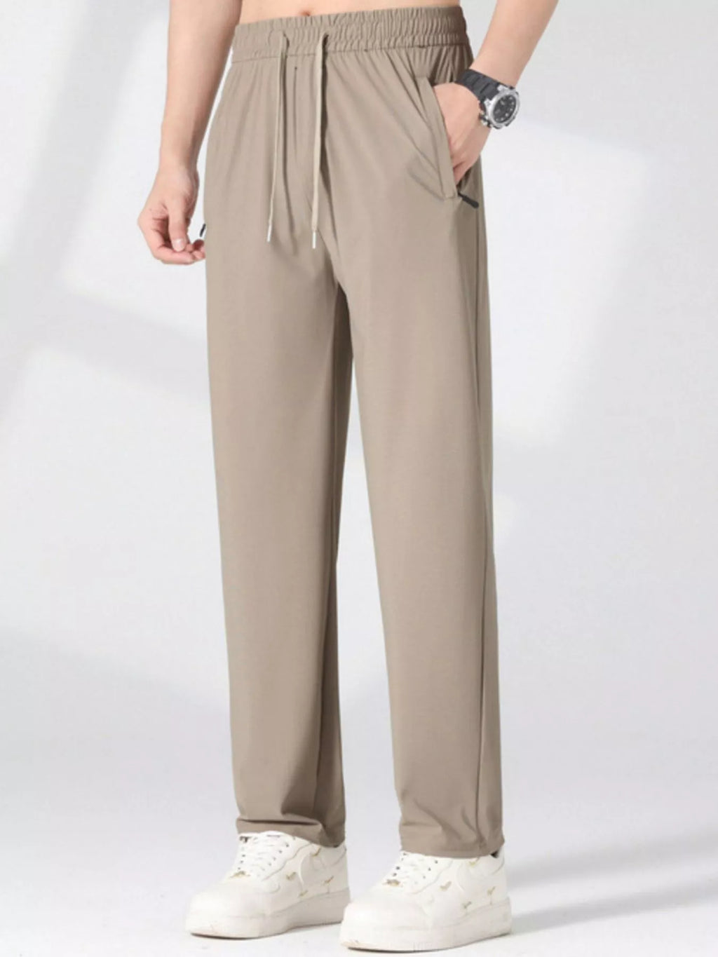 Plus size men's casual lightweight quick-dry pants by Trendsi, shown in a relaxed fit with a smooth fabric finish.