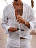 Men's full-size button-up long sleeve shirt by Trendsi, featuring a classic collar and button front in a versatile style.