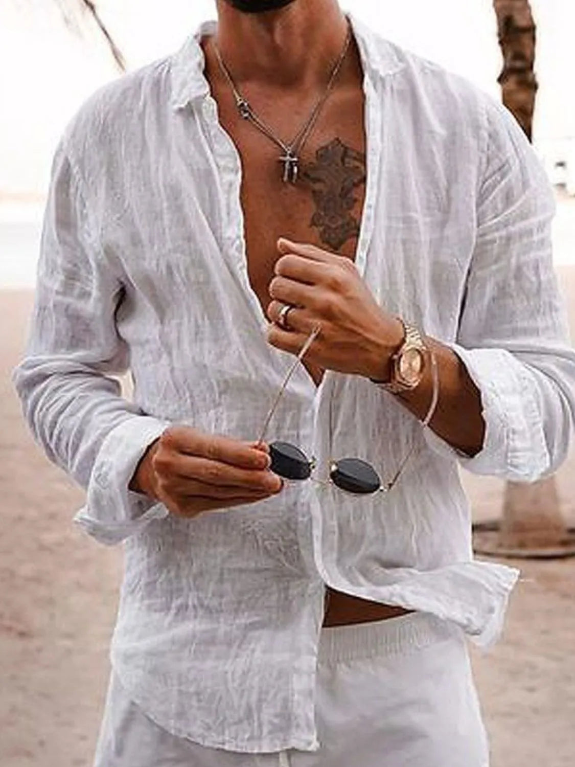 Men's full-size button-up long sleeve shirt by Trendsi, featuring a classic collar and button front in a versatile style.