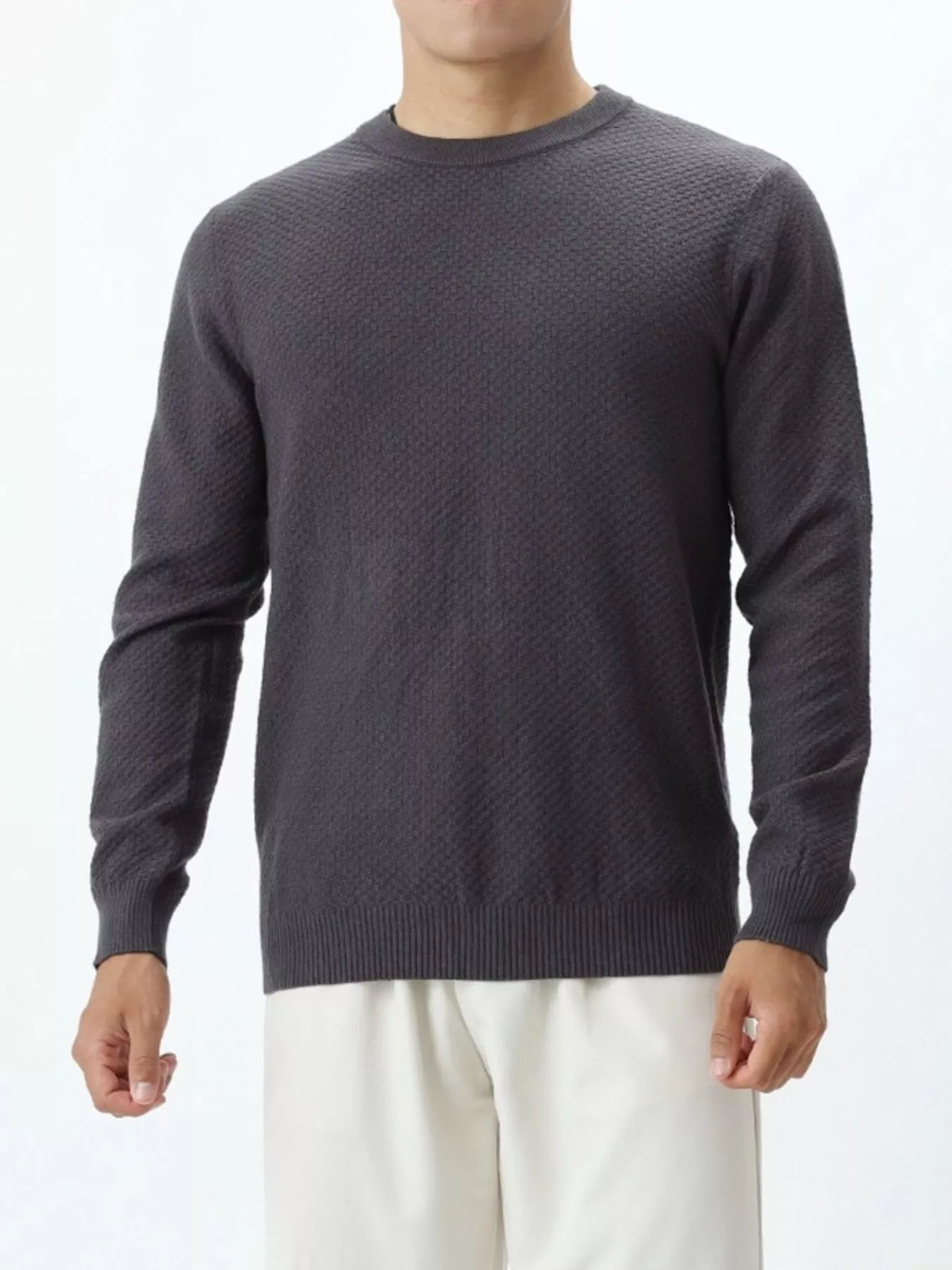 Plus size textured crew neck sweater for men by Trendsi, featuring a cozy knit fabric and classic fit.