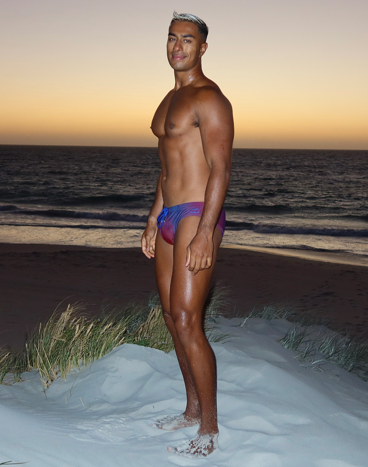 CityBOYZ USA 2Eros Pixel Pop men's swim brief featuring colorful pixel pattern and snug fit for stylish swimwear.