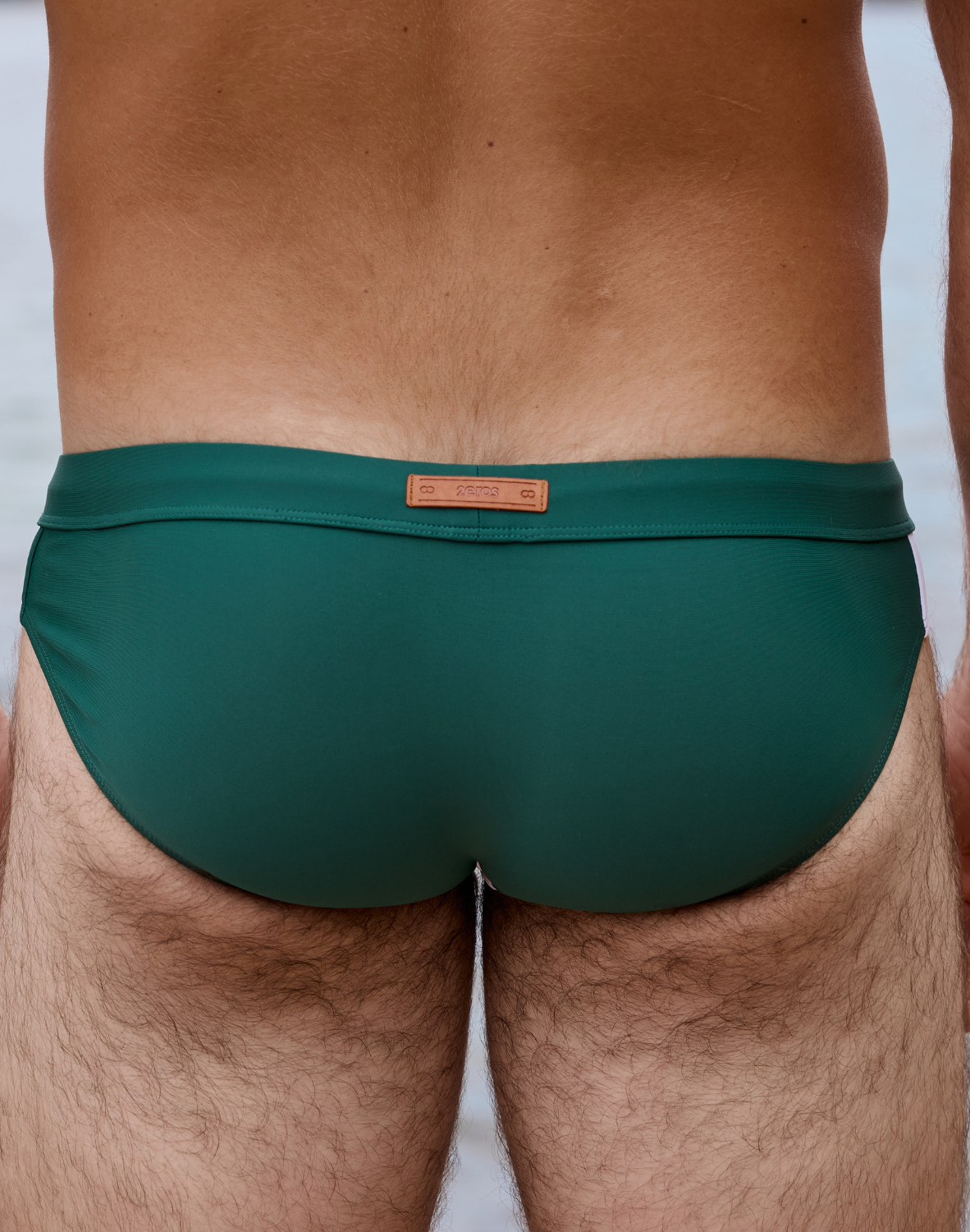 Color blocked swim brief by CITYBOYZ★USA, featuring vibrant blue, black, and white panels in premium men's swimwear style.
