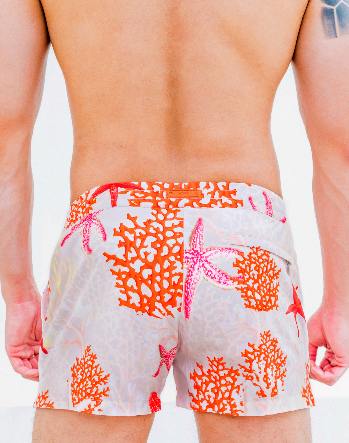 CityBOYZ★USA 2Eros Starscape swim shorts featuring a vibrant star pattern and adjustable waistband for comfortable beachwear.