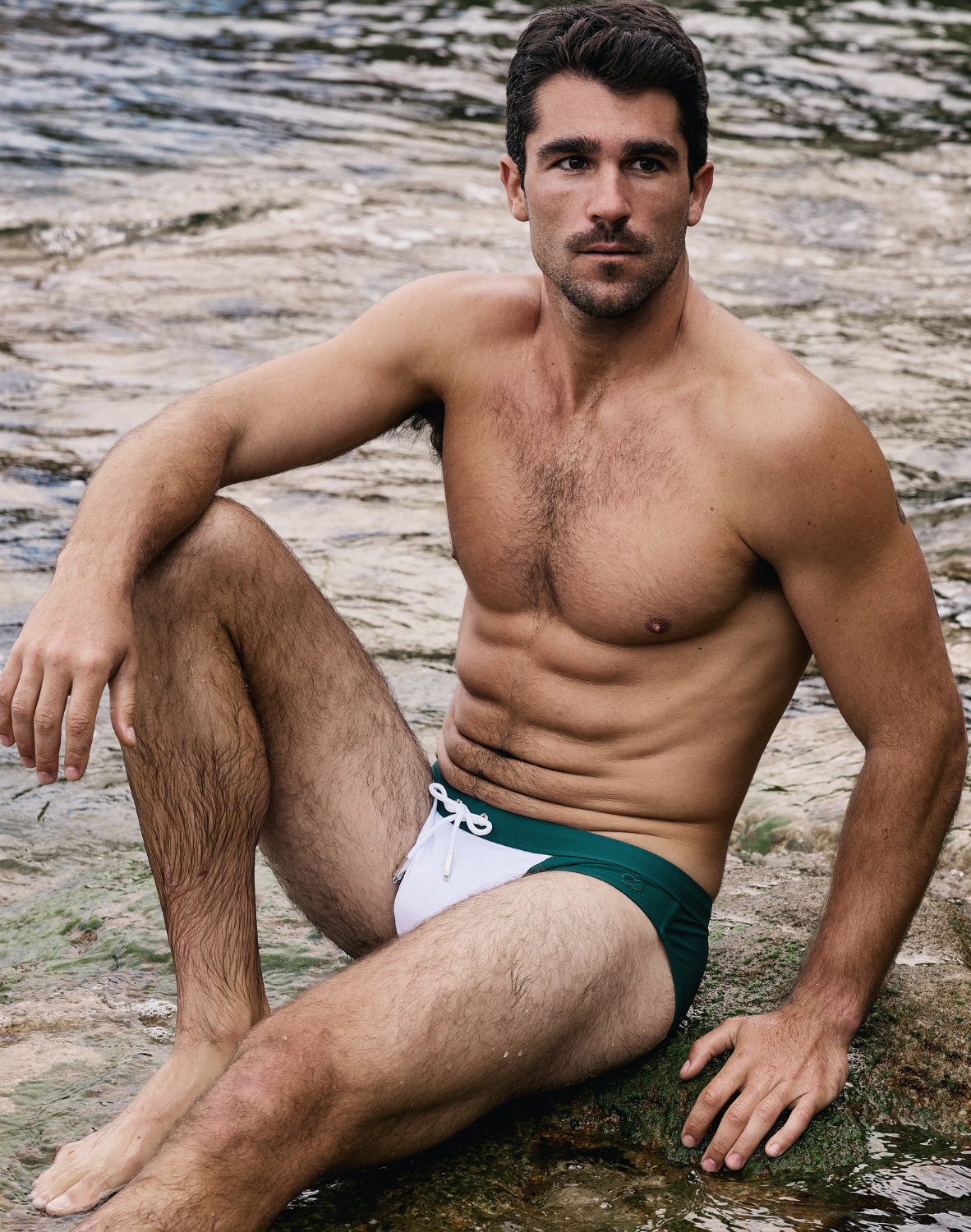 CityBOYZ USA 2Eros color-blocked swim brief featuring bold red, blue, and white panels, designed for stylish men's swimwear.