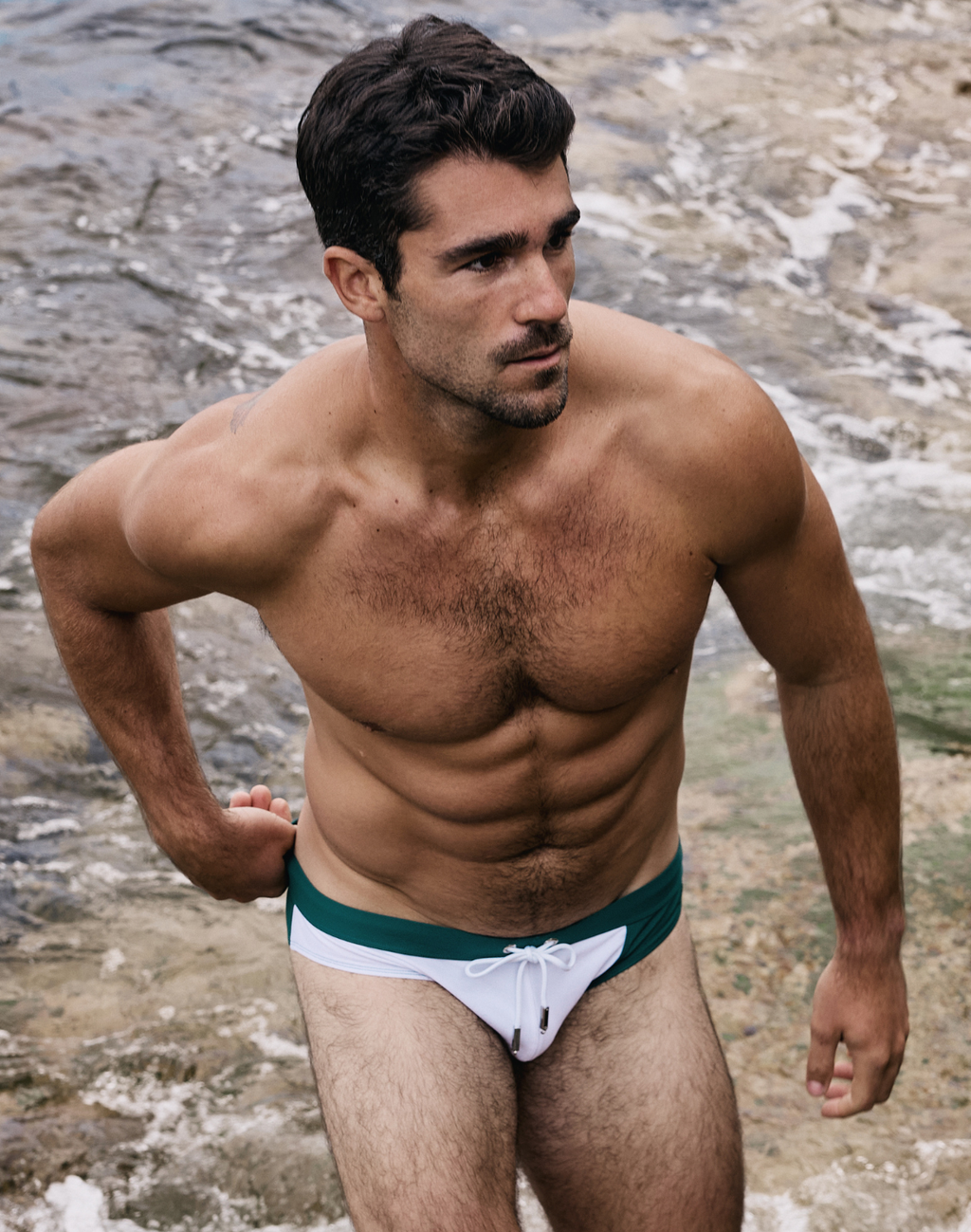 Color blocked swim brief by CITYBOYZ★USA, featuring vibrant blue and orange panels, fitted design, and comfortable swimwear style.