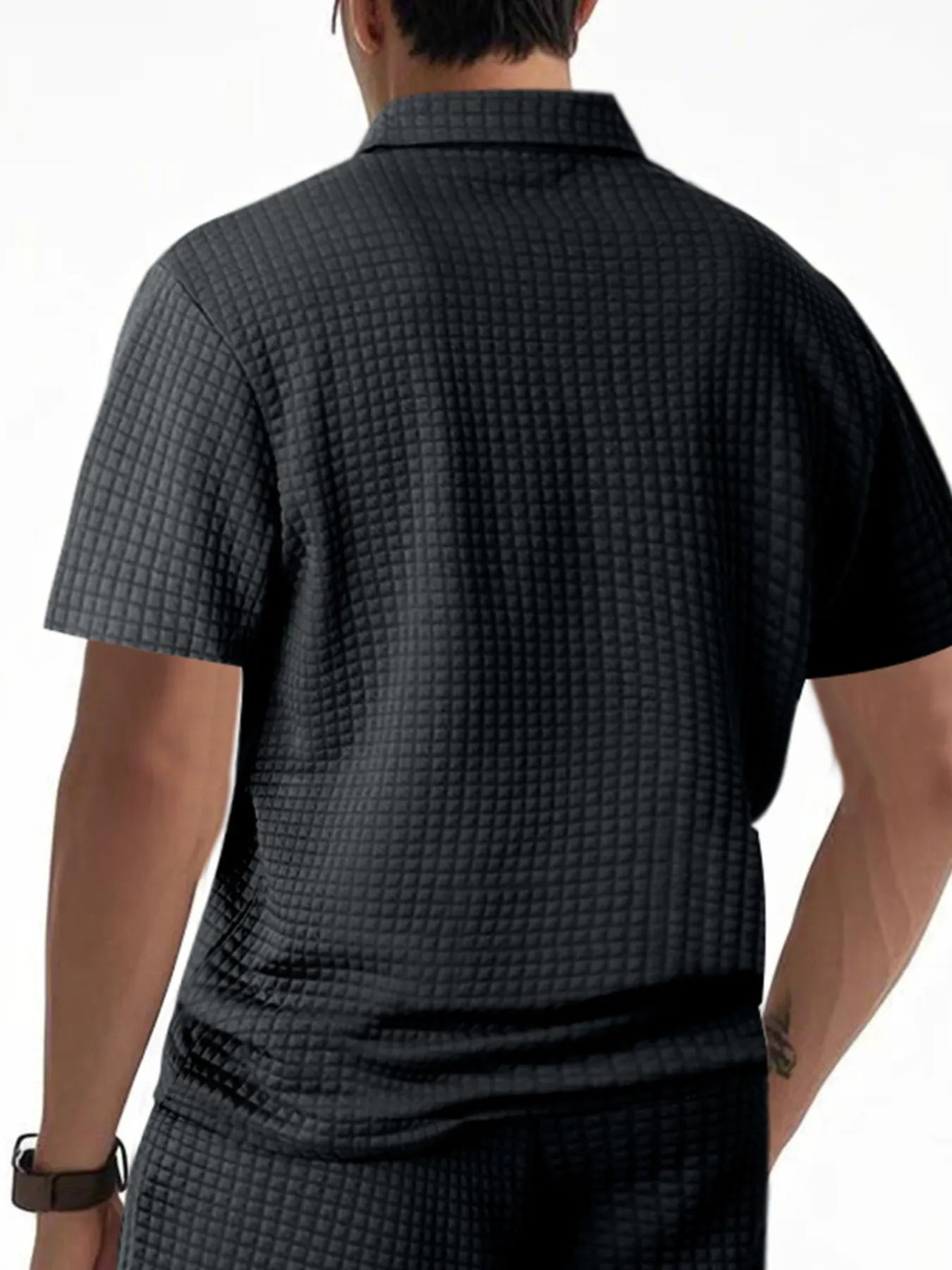 Men's waffle short sleeve polo shirt with zipper detail by Trendsi, featuring a stylish and casual design in a comfortable fabric.