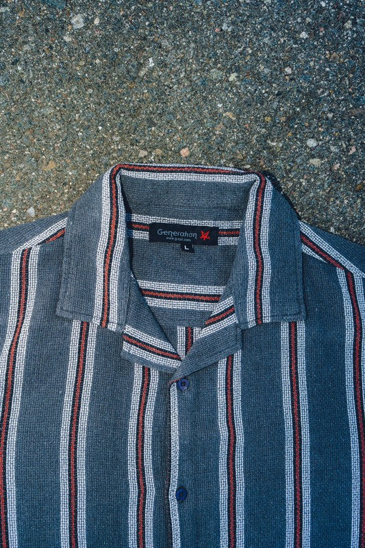 Men's textured striped shirt by Generation XYZ featuring a classic design, with visible collar and button-down front.