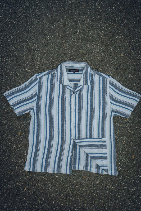 Men's textured striped shirt by Generation XYZ featuring a classic fit, button-down collar, and stylish pattern in natural fabric.