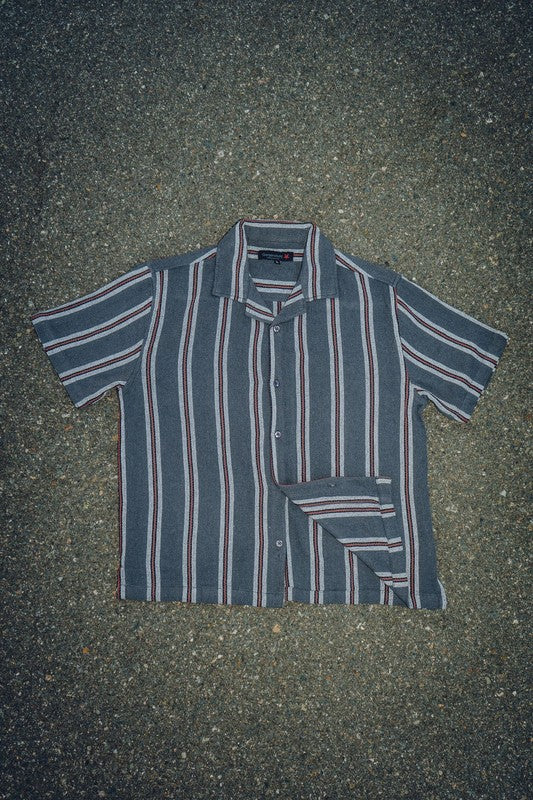 Men's textured striped shirt by Generation XYZ, showing close-up of fabric with vertical stripes and detailed collar.