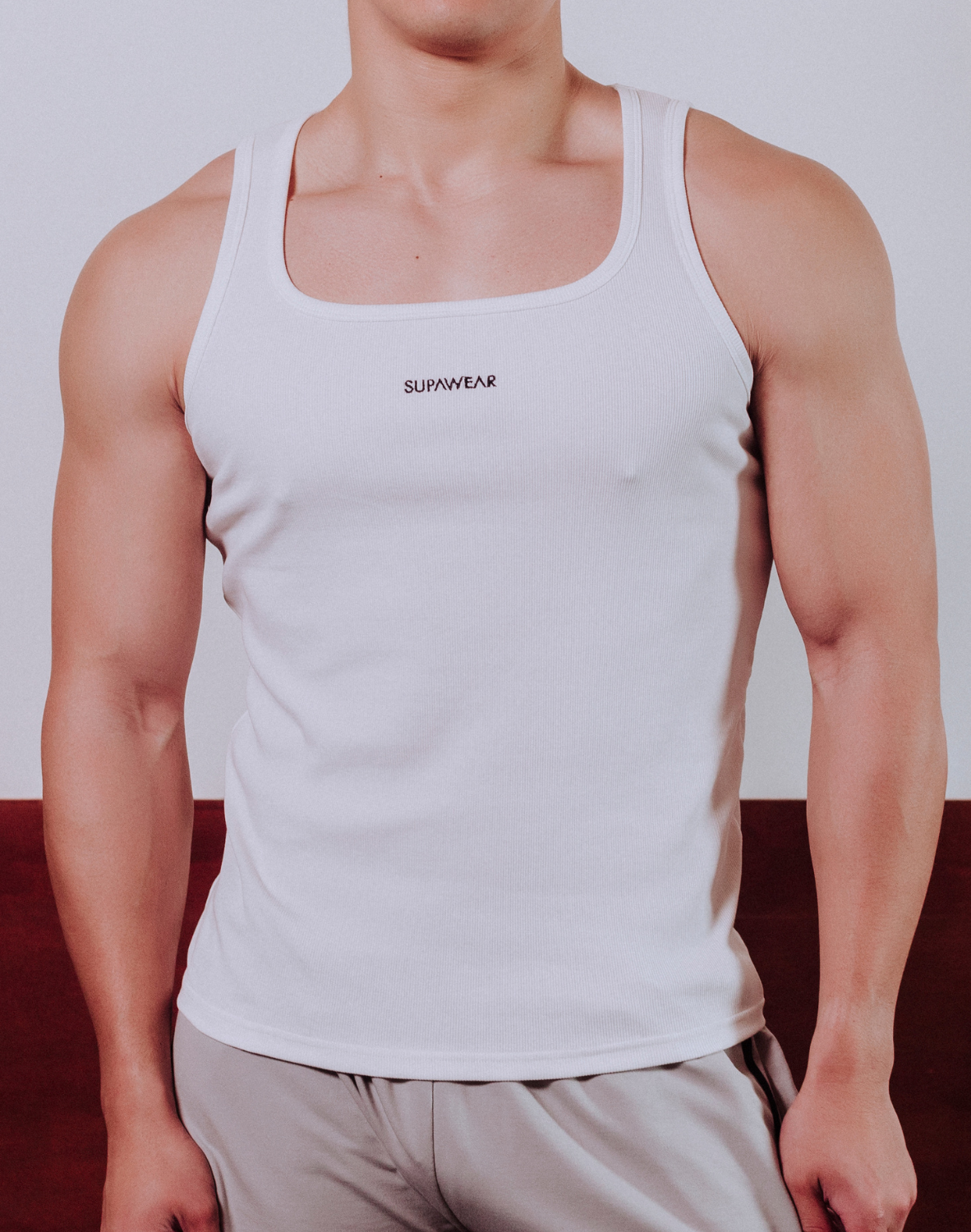 CITYBOYZ★USA Supawear semi-squared tank top, lightweight sleeveless shirt with a fitted style, shown in a casual pose.