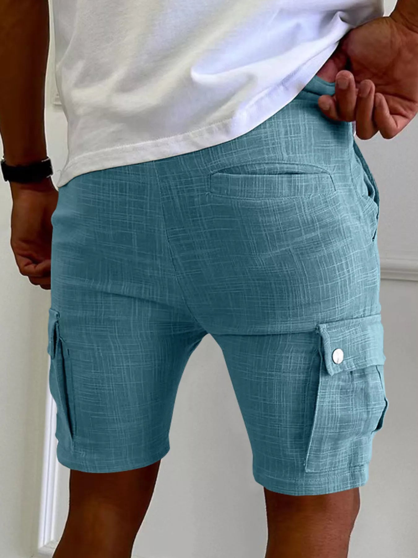 Men's casual shorts from Trendsi, styled with a short sleeve polo, perfect for relaxed summer looks.