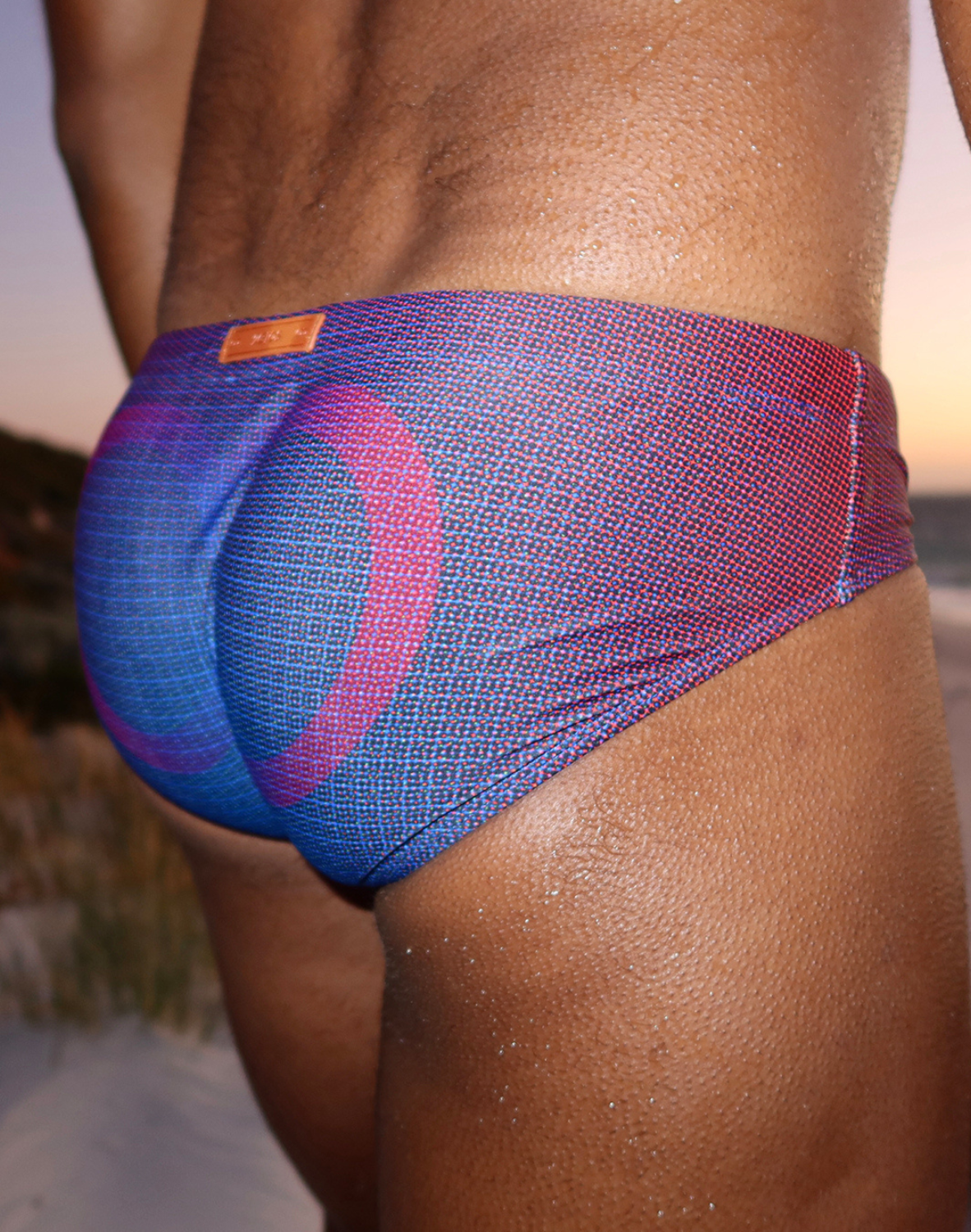 CityBOYZ USA 2Eros Pixel Pop swim brief with vibrant pixel pattern, snug fit, and bold design for men's swimwear.