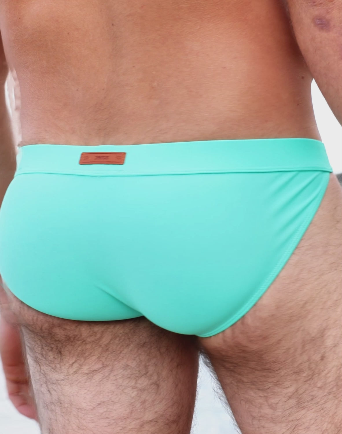 CityBOYZ USA 2Eros Encore Swim Tanga V50 swim brief in vibrant fabric, featuring sleek design and comfortable fit for swimming.
