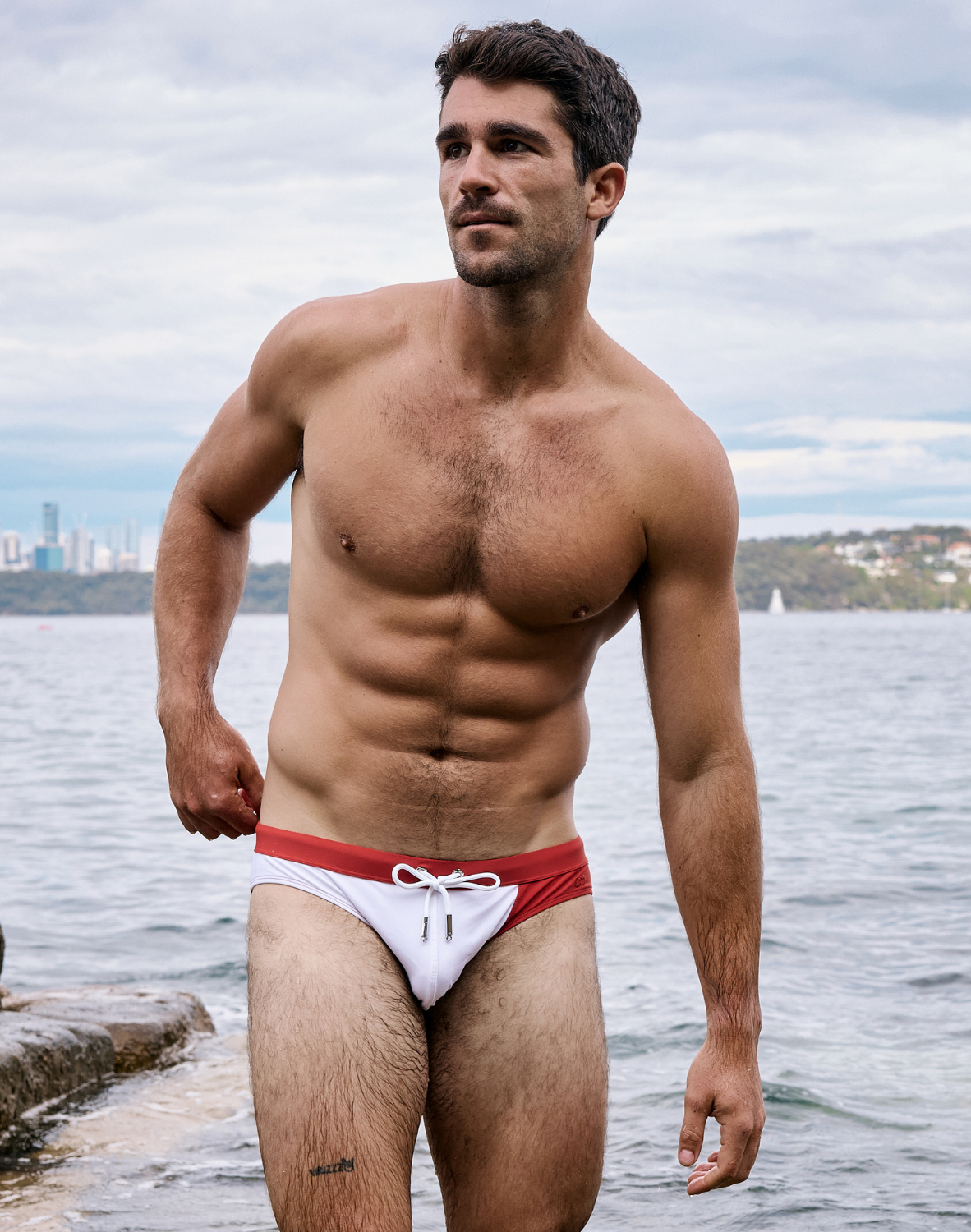 Color blocked CITYBOYZ USA 2Eros swim brief featuring vibrant blue, black, and white panels, designed for stylish swimwear.