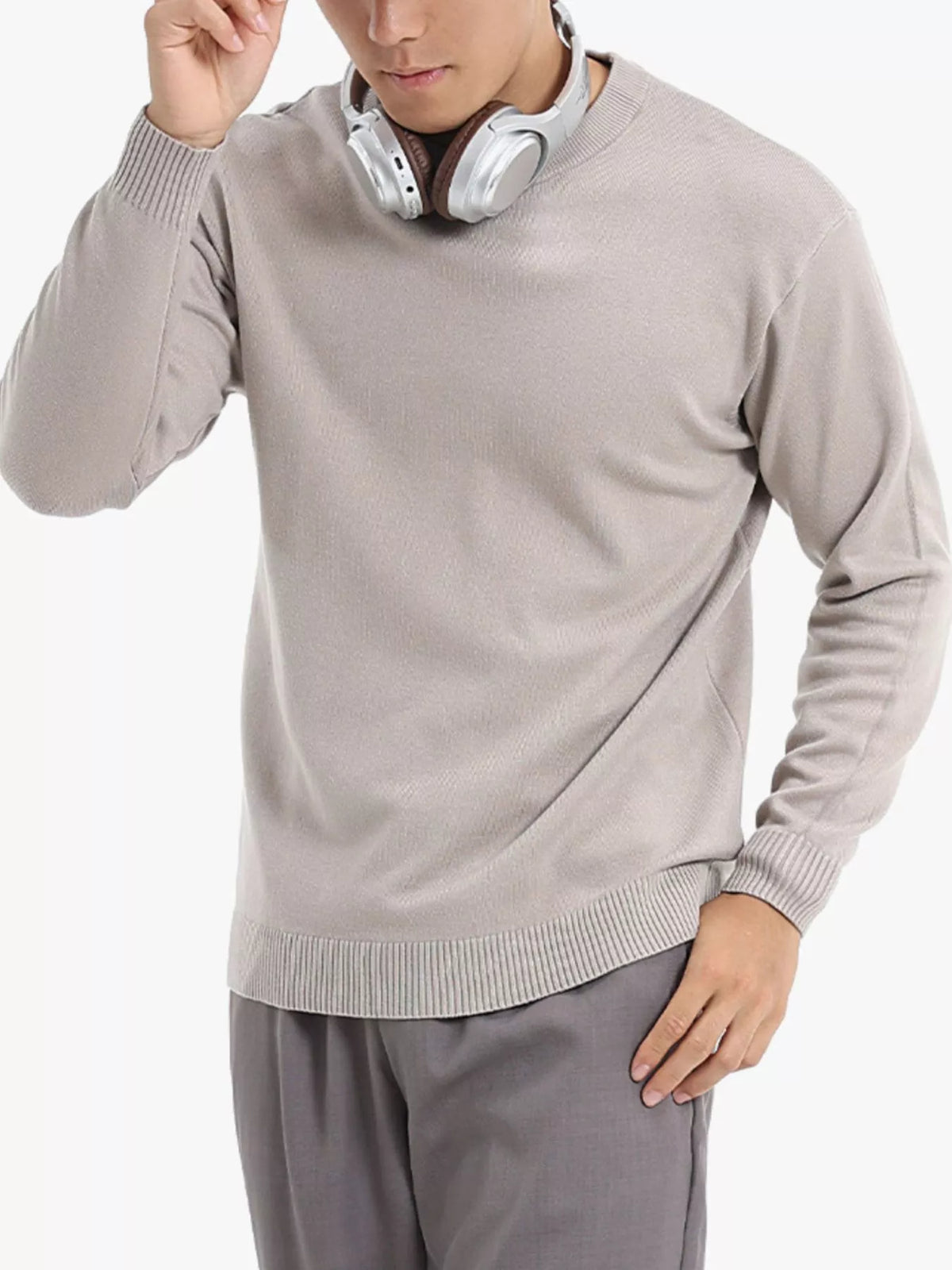 Men's minimalist crew neck sweater with ribbed cuffs, in a neutral color, by Trendsi, featuring a clean, simple design.