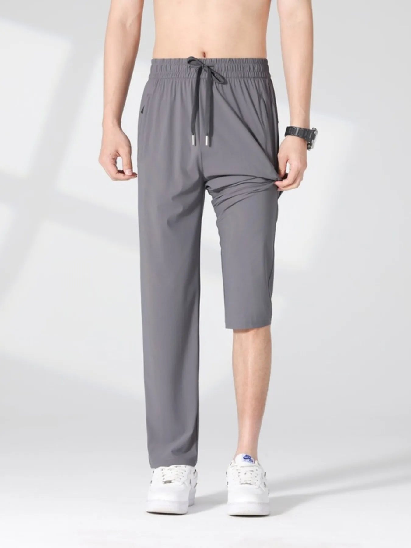 Plus size men's casual lightweight quick-dry pants from Trendsi, shown in a relaxed fit with breathable fabric.
