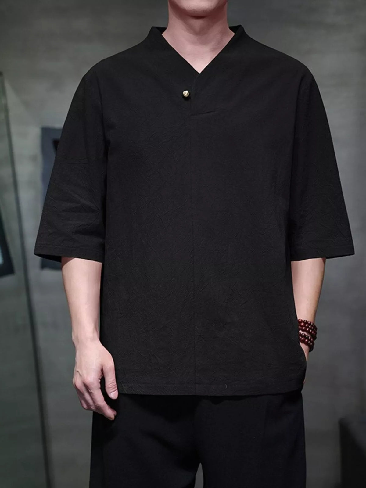 Men's plus size solid color 3/4 sleeve shirt by Trendsi, featuring a casual, comfortable fit and modern design.