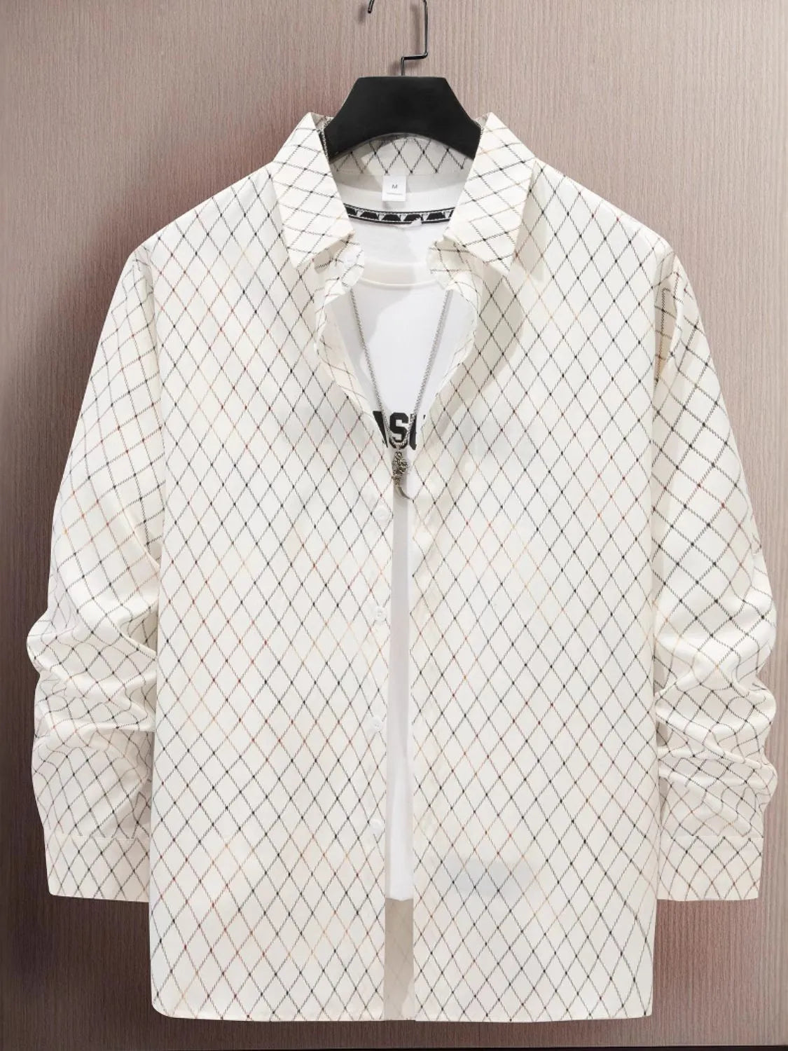Plus size men's button-up long sleeve shirt by Trendsi, featuring a classic fit and full-length sleeves.