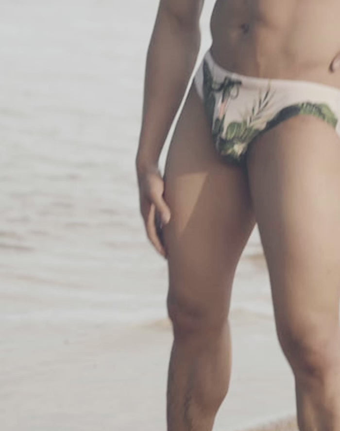 CITYBOYZ★USA 2Eros Exotica swim brief in vibrant, tropical print, showcasing bright colors and sleek fit on a mannequin.
