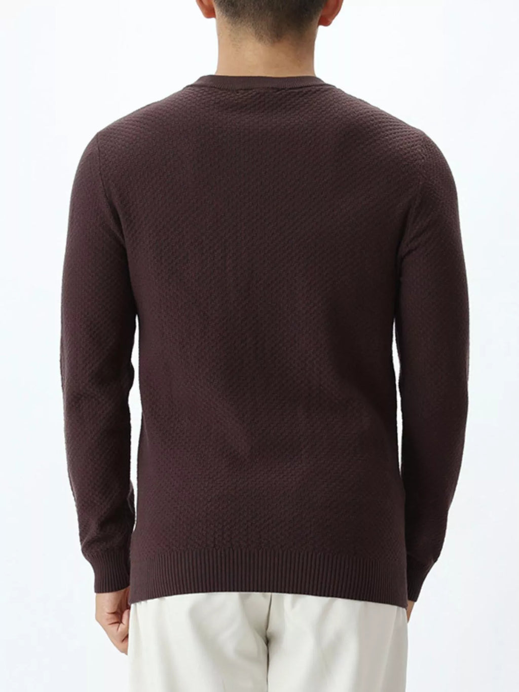 Plus size men's textured crew neck sweater by Trendsi, showing a cozy knit fabric in a close-up view.