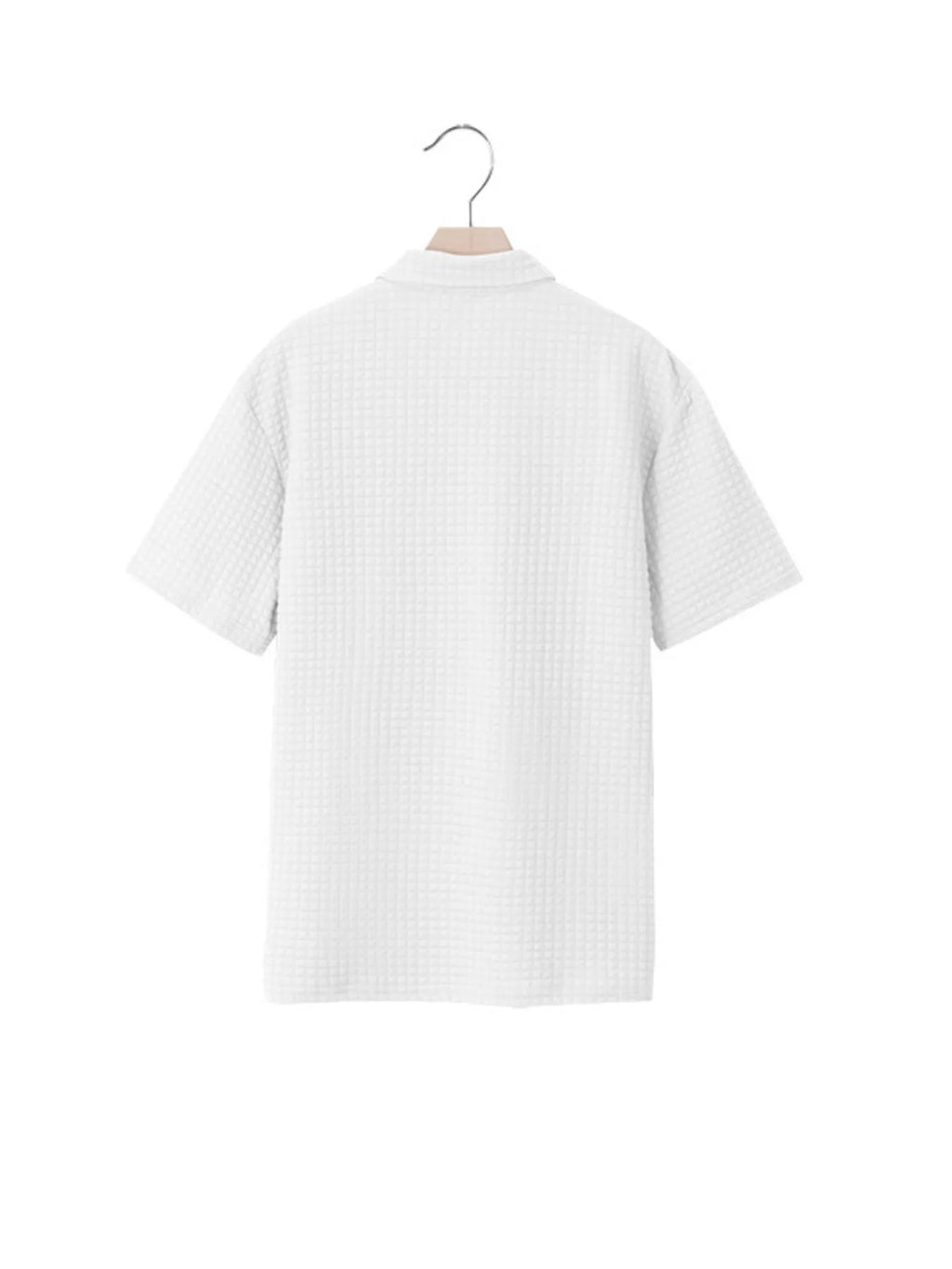 Men's waffle short sleeve polo shirt with zipper detail by Trendsi, featuring a stylish collar and textured fabric.