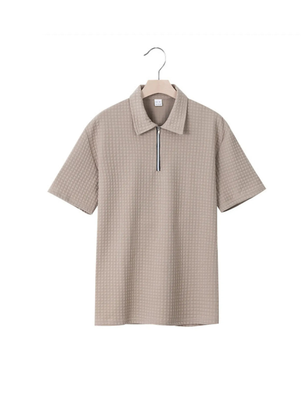 Men's waffle short sleeve polo shirt with zipper detail, trendy DapperMate shirt by Trendsi, lightweight and stylish for casual wear.
