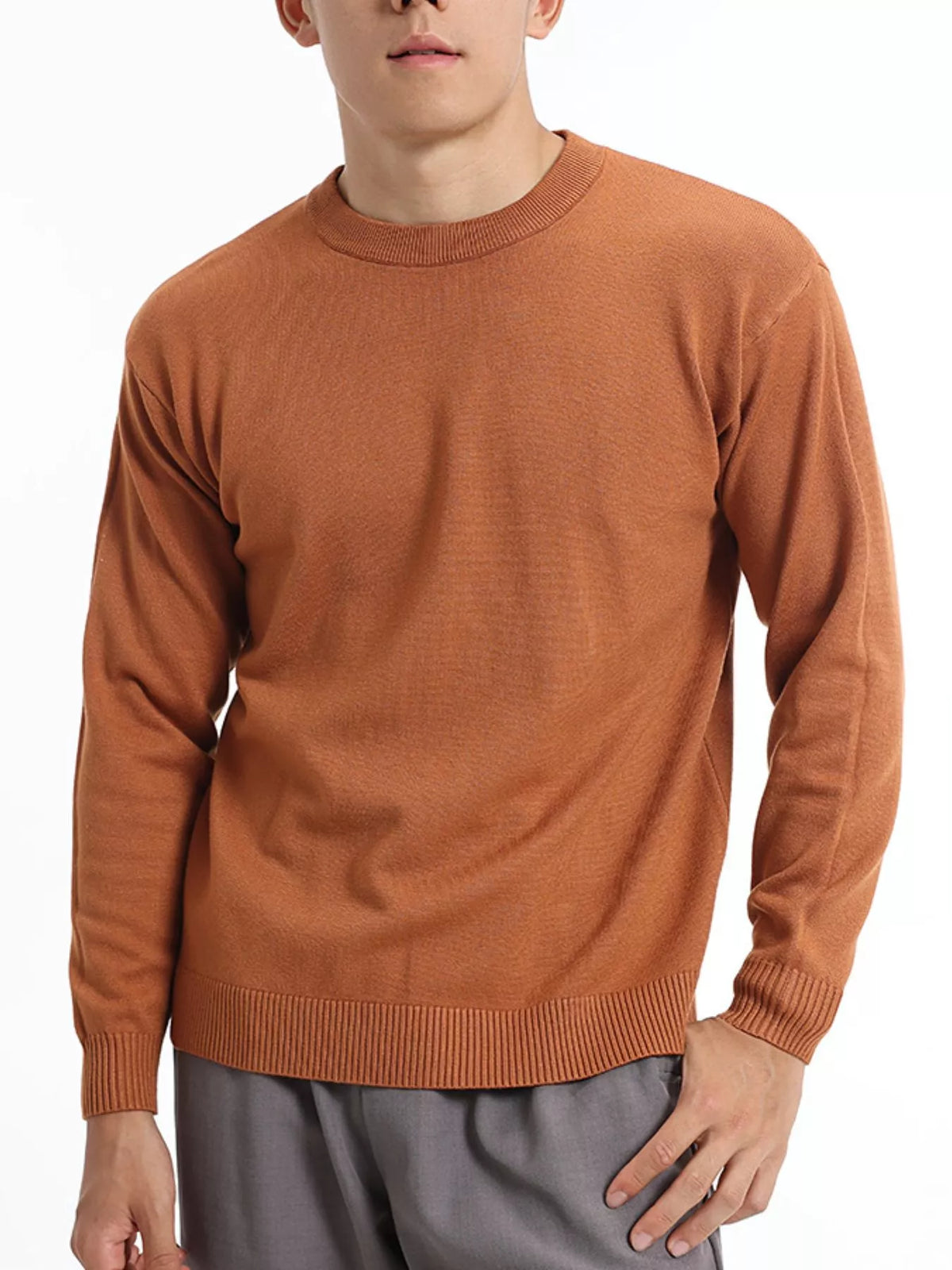 Men's minimalist crew neck sweater with ribbed cuffs by Trendsi, featuring a simple, clean design in neutral fabric.