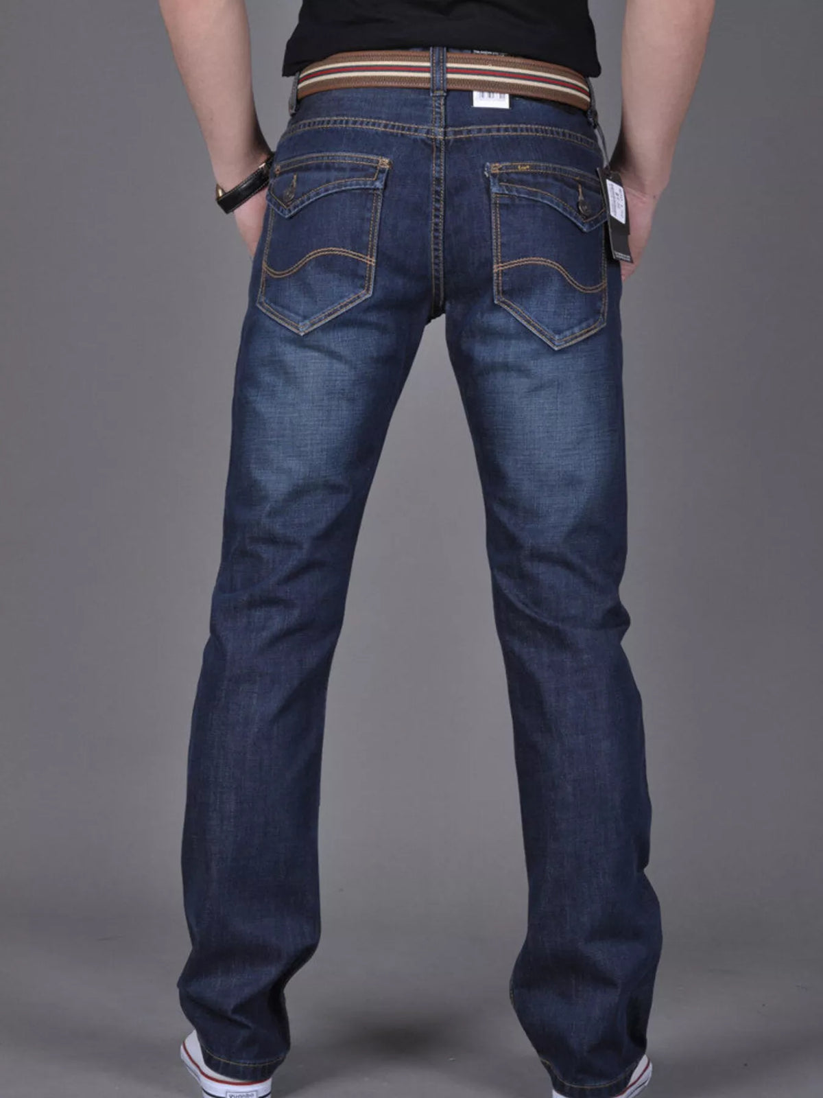 Nobilityze men's slim fit jeans from Trendsi, showing dark wash denim pants with a classic five-pocket design and slim silhouette.