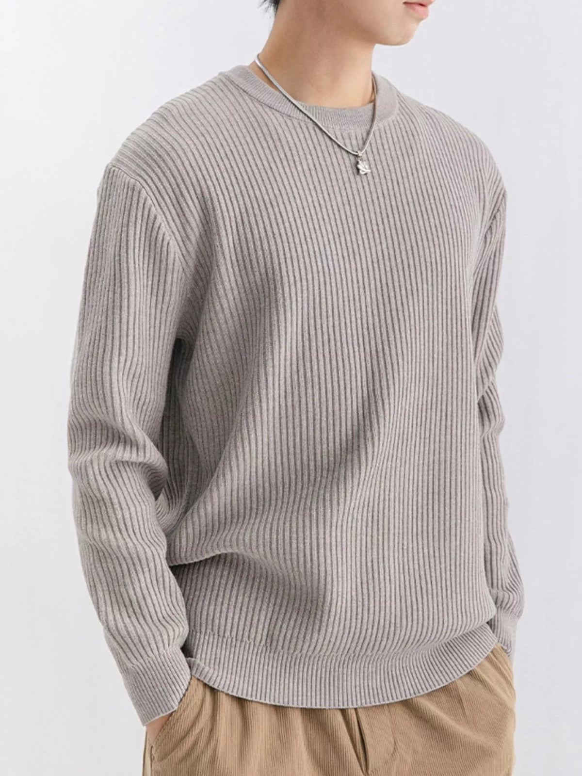 Plus size men's ribbed knit crew neck sweater by Trendsi, featuring a cozy, textured fabric in a classic fit.