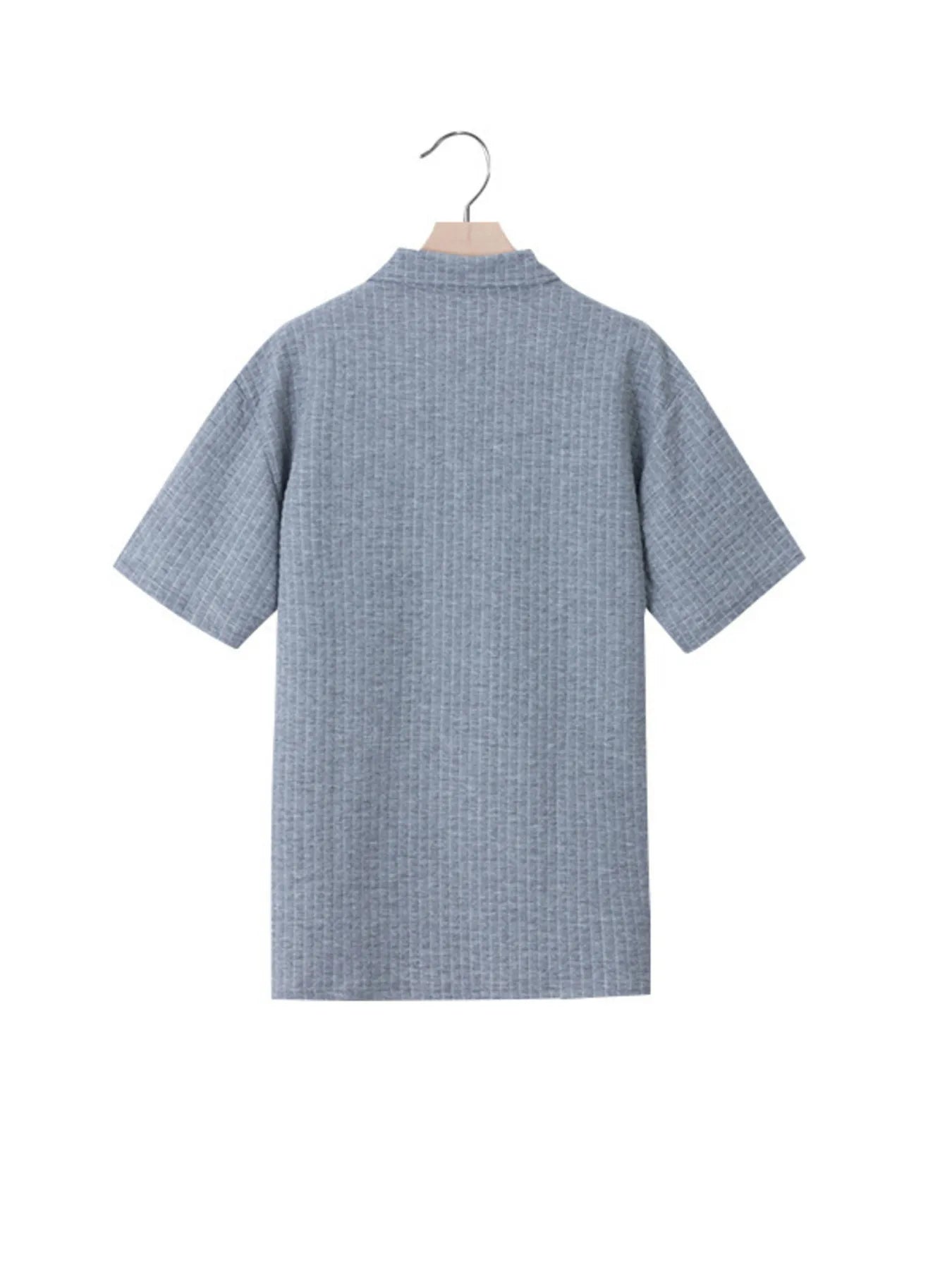 Men's waffle short sleeve polo shirt with zipper detail by Trendsi, featuring a stylish collar and textured fabric.