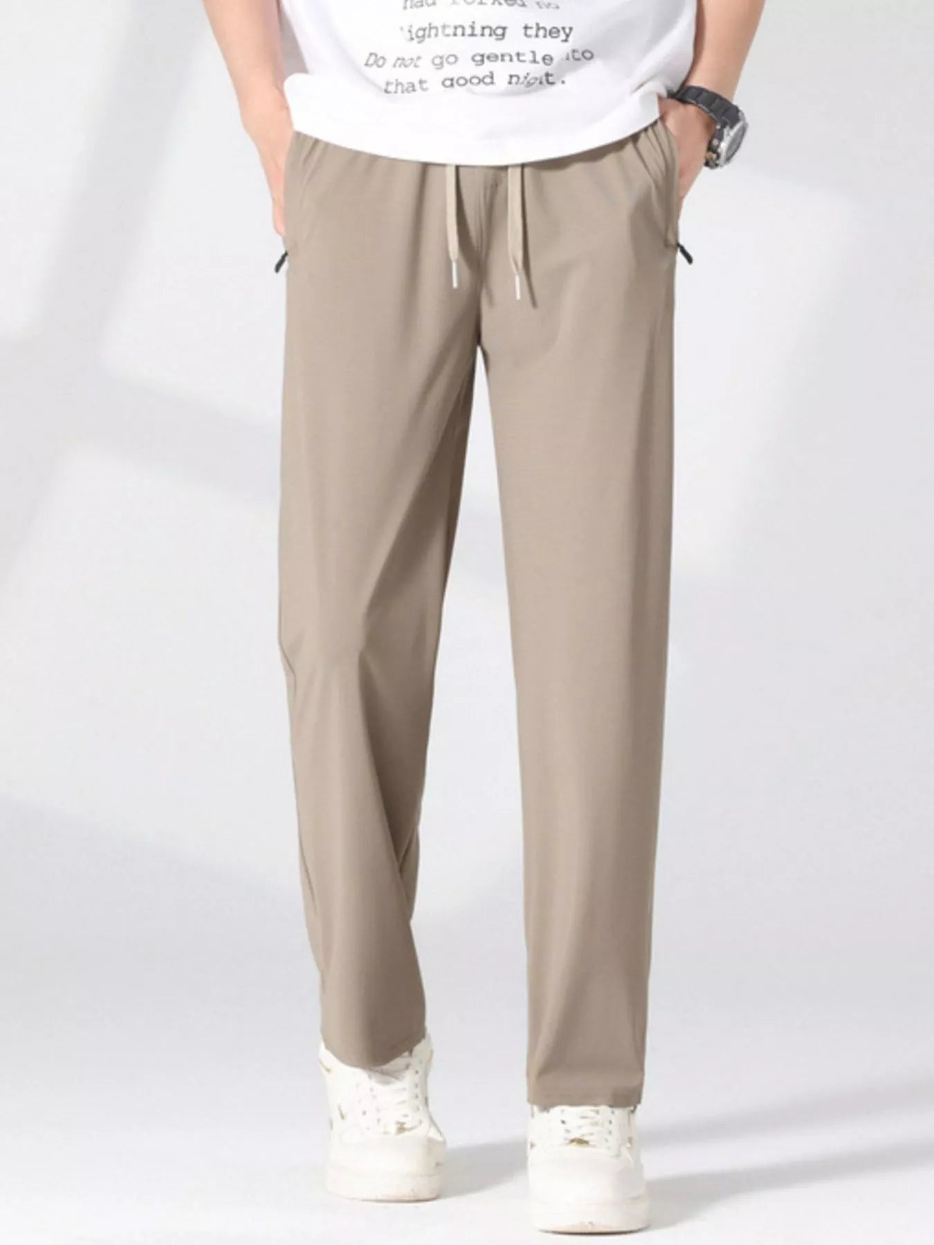 Plus size men's lightweight quick-dry casual pants by Trendsi, shown in a relaxed fit with breathable fabric and comfortable design.