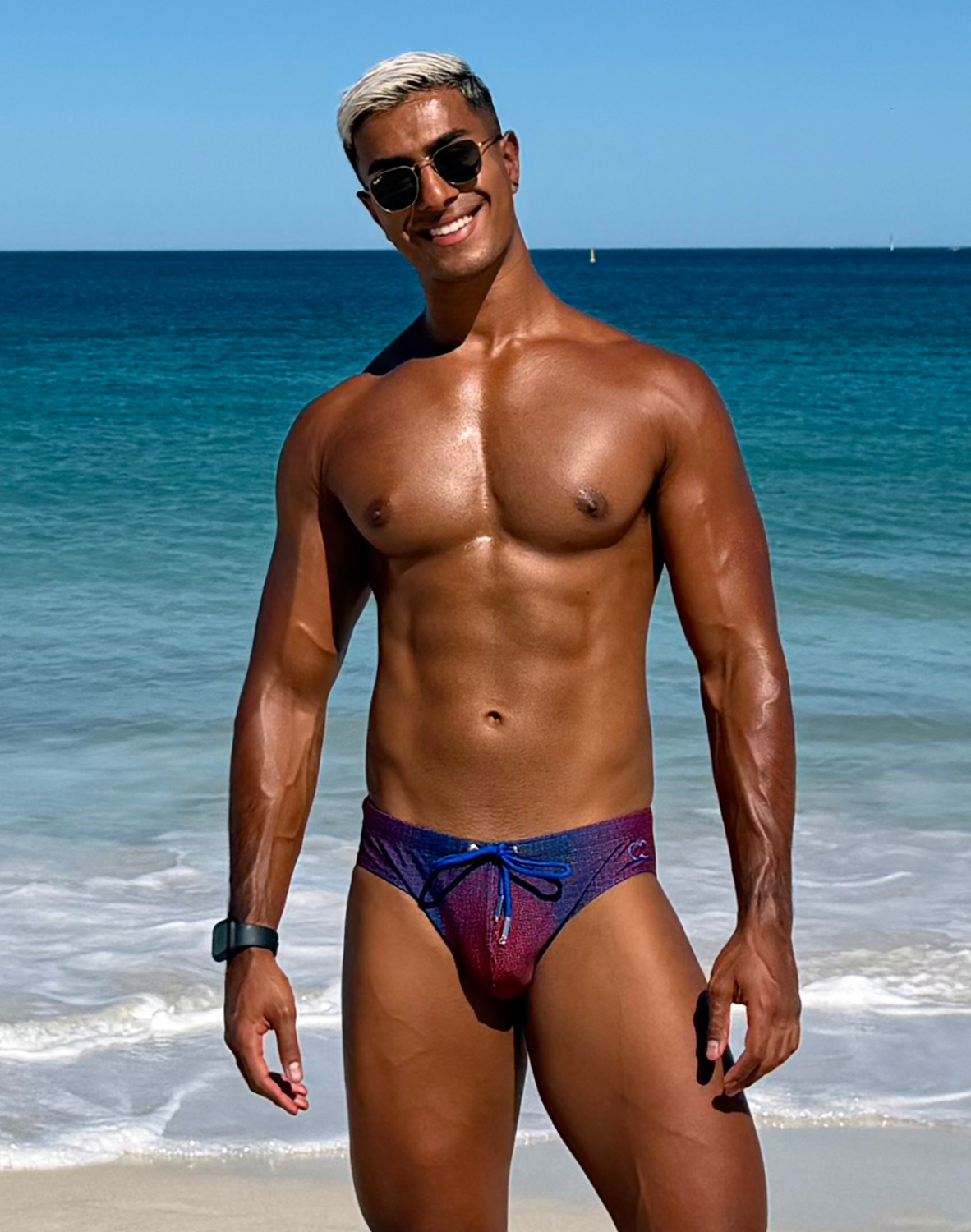 CITYBOYZ★USA 2Eros Pixel Pop swim brief showing vibrant pixel pattern and snug fit in a close-up view.
