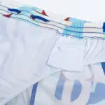CityBOYZ★USA 2Eros Insignia print swim shorts, lightweight men's swimwear with bold insignia design, perfect for beach or pool.