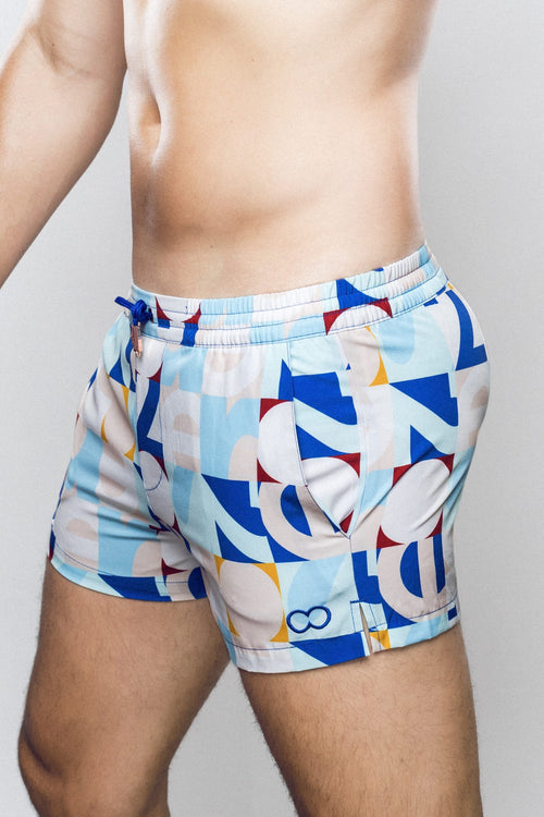 CityBOYZ★USA 2Eros Insignia print swim shorts with bold design and comfortable fit, perfect for beach or pool wear.