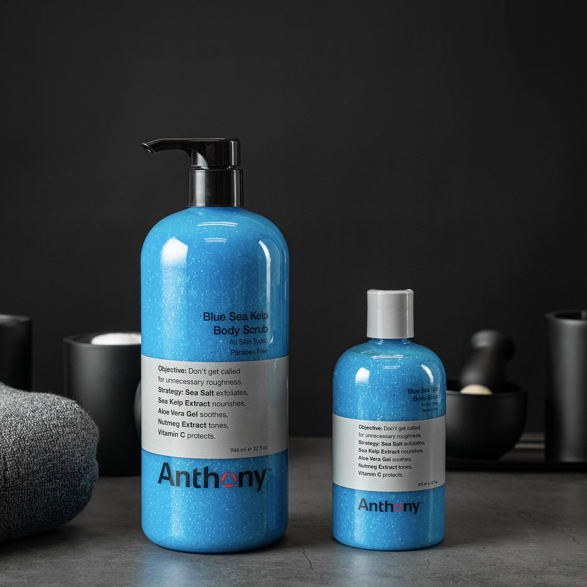 Anthony Blue Sea Kelp Body Scrub by CITYBOYZ USA, men's exfoliating grooming scrub in 12oz and 32oz bottles, shown in lifestyle setting.