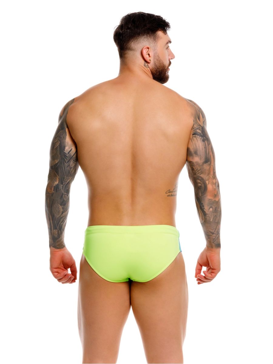 Men's green neon swim brief by CITYBOYZ★USA, featuring a sleek design and elastic waistband for comfortable swimwear.