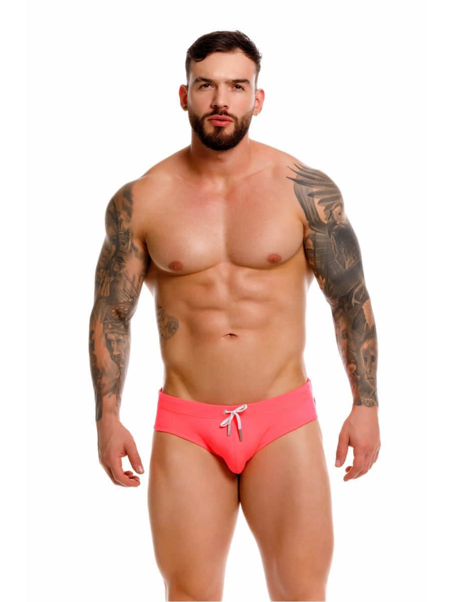 Men's neon swim briefs by CITYBOYZ USA, featuring bright, colorful design and snug fit, perfect for beach or pool.