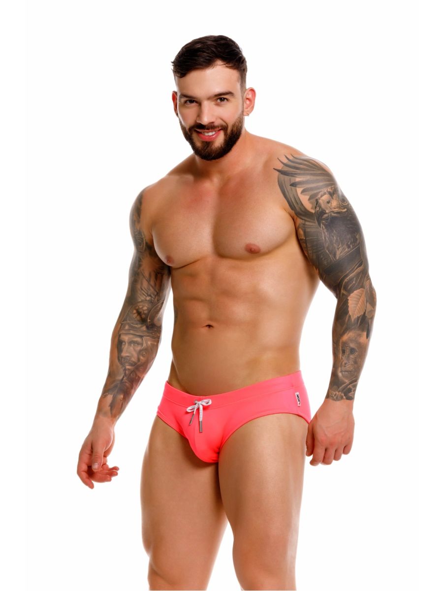 Men's neon swim brief by CITYBOYZ★USA, featuring vibrant candy-colored design, perfect for beach or pool activities.