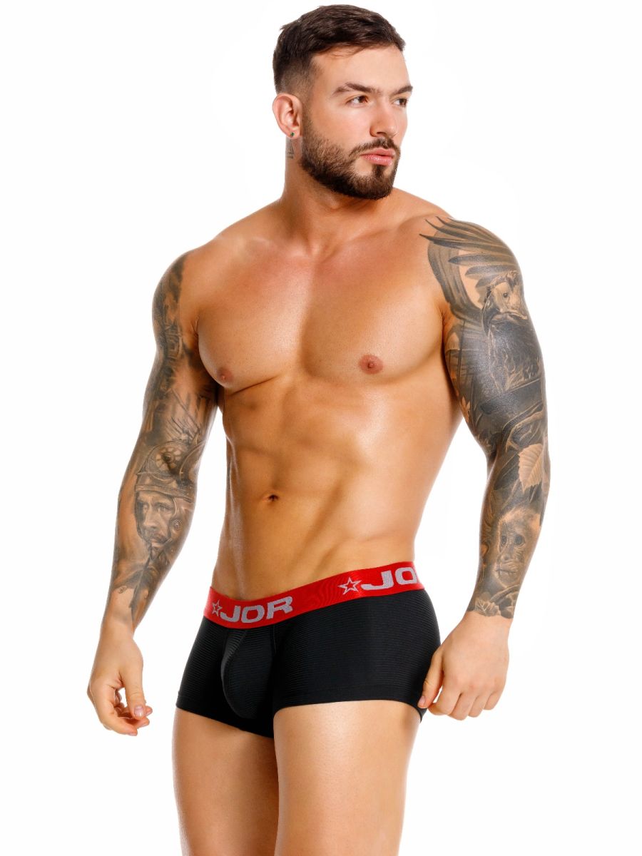 Black CITYBOYZ★USA Jor Astor Trunk with sturdy handle and metal accents, showcasing its durable design and spacious interior.