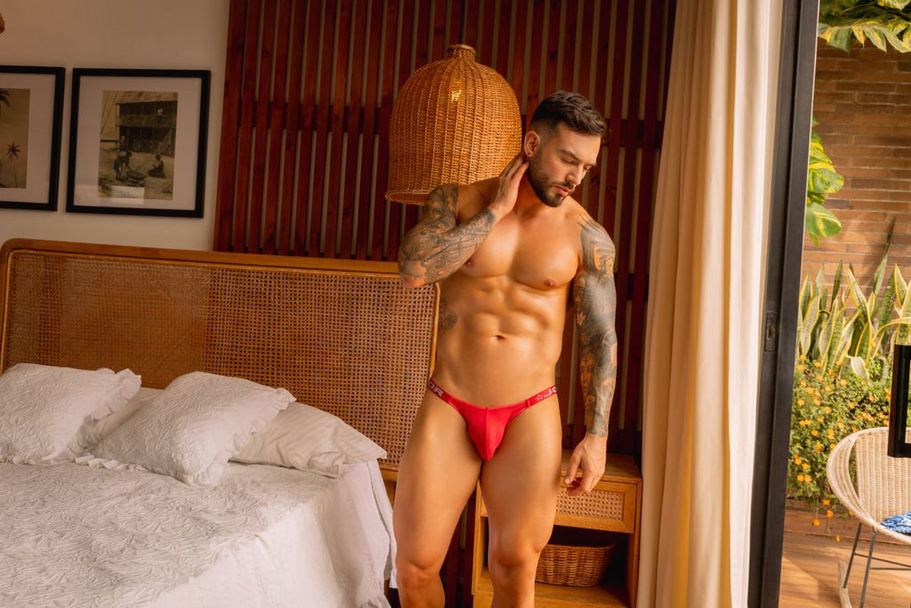 Red CITYBOYZ★USA Jor Frost jockstrap with supportive waistband and front pouch, displayed on a white background.