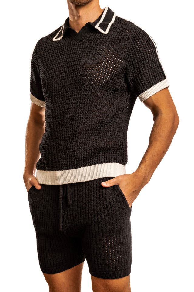 Black Jack Adams Matteo crochet knit pullover shirt with collared neckline, styled on a model in profile view.