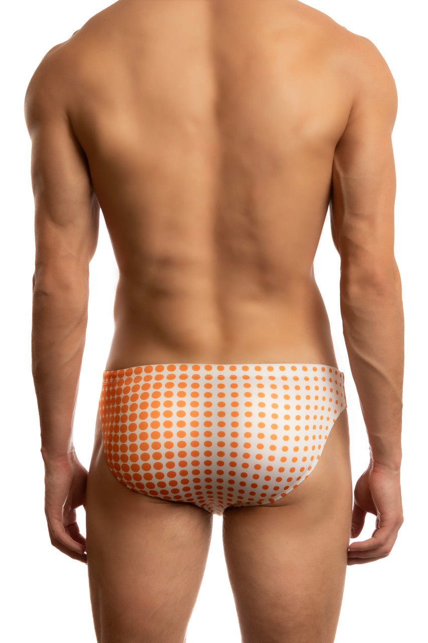 Jack Adams Dot Matrix 1" swim racer brief by CITYBOYZ USA, orange with black dot pattern, close-up of back view.