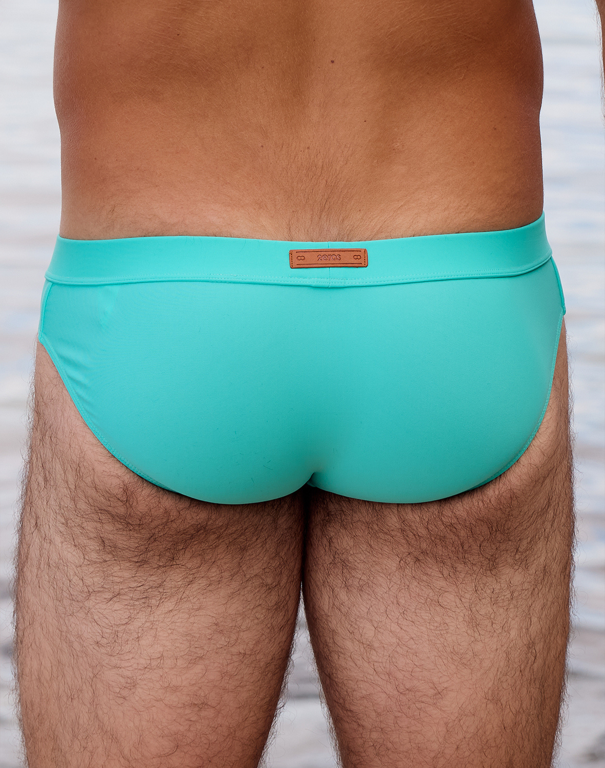 Neon blue 2Eros Encore swim brief by CITYBOYZ★USA, showcasing a sleek, vibrant men's swimwear design with bold color.