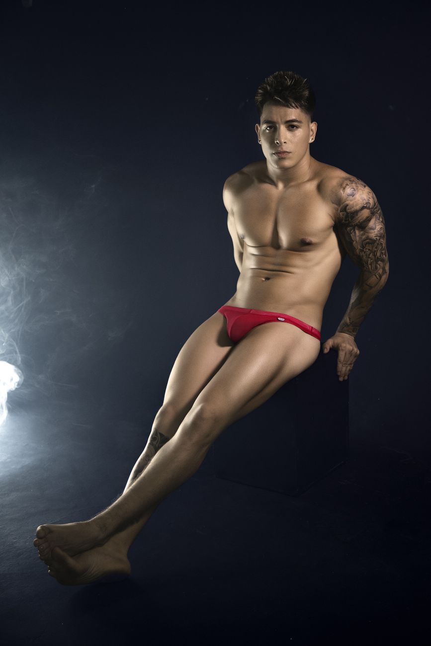 Red Pikante Luxury Thong 1823 by CITYBOYZ USA featuring sleek design and comfortable fit, showcased on a model.