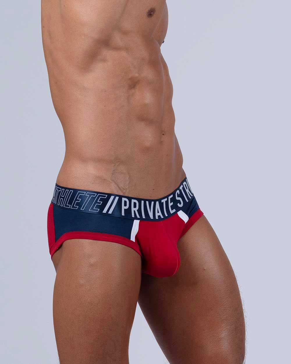 Red Falcon Private Structure Mini Brief by CITYBOYZ★USA, featuring a snug fit and sleek design, shown on a model.