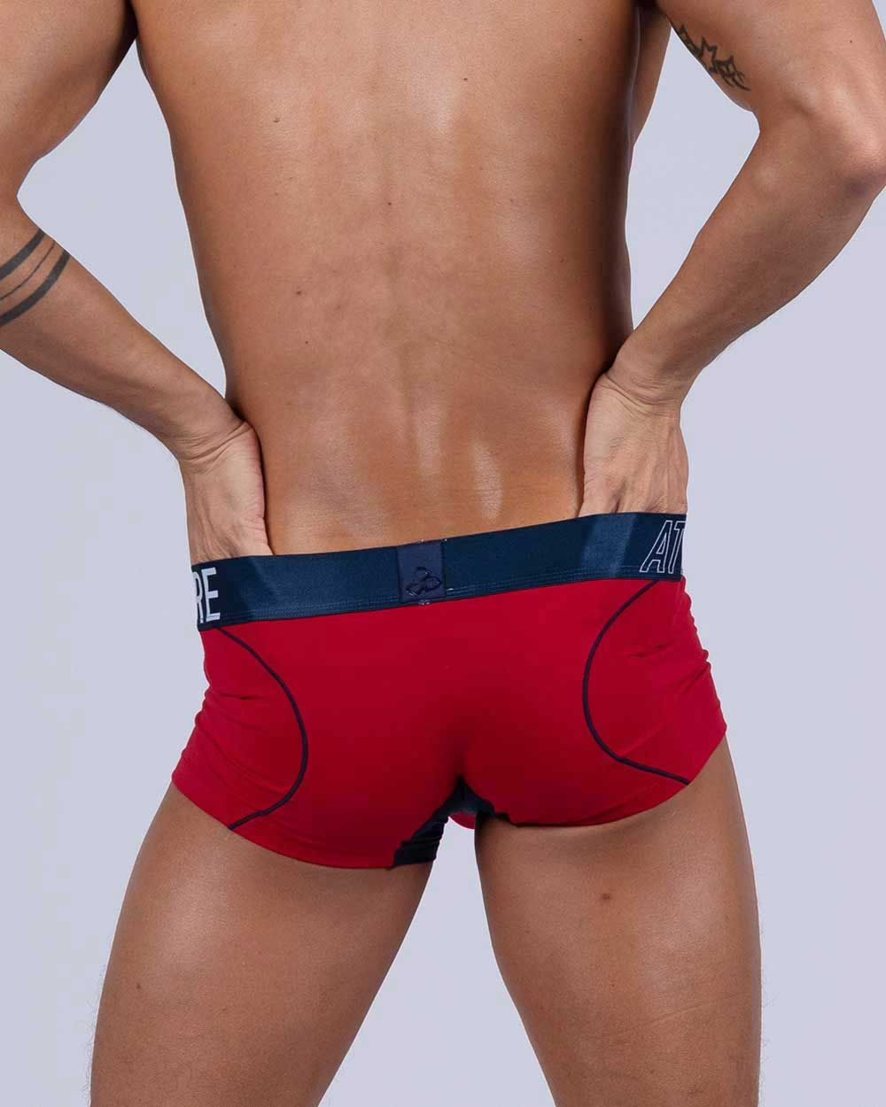 Private Structure Athlete Trunk by CITYBOYZ★USA in red with a sleek, athletic design, displayed on a neutral background.
