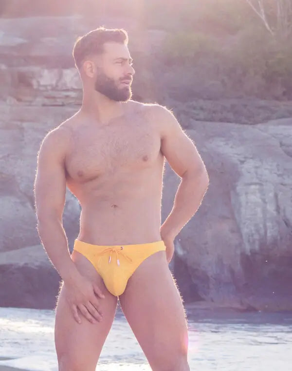 Yellow 2Eros Ripple Textured Swim Thong by CITYBOYZ★USA, showing the ripple pattern and minimal design for swimwear.