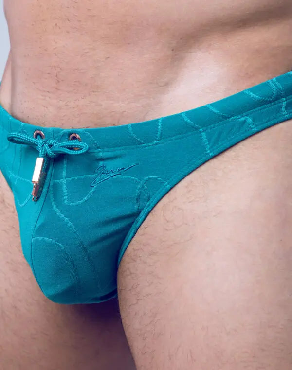 Green 2Eros Ripple Textured Swim Thong by CITYBOYZ★USA, featuring a ripple pattern and minimal coverage, perfect for swimwear.