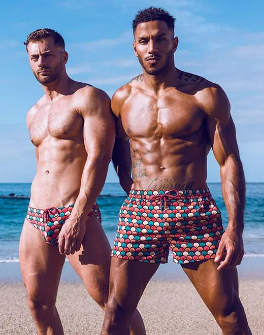 Red retro-style swim shorts from CITYBOYZ★USA, featuring a relaxed fit and bold design, perfect for beach or poolside wear.