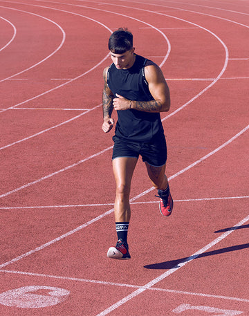 CITYBOYZ★USA Supawear SPR Racer Short athletic shorts in black with blue accents, designed for active wear, shown on a model.